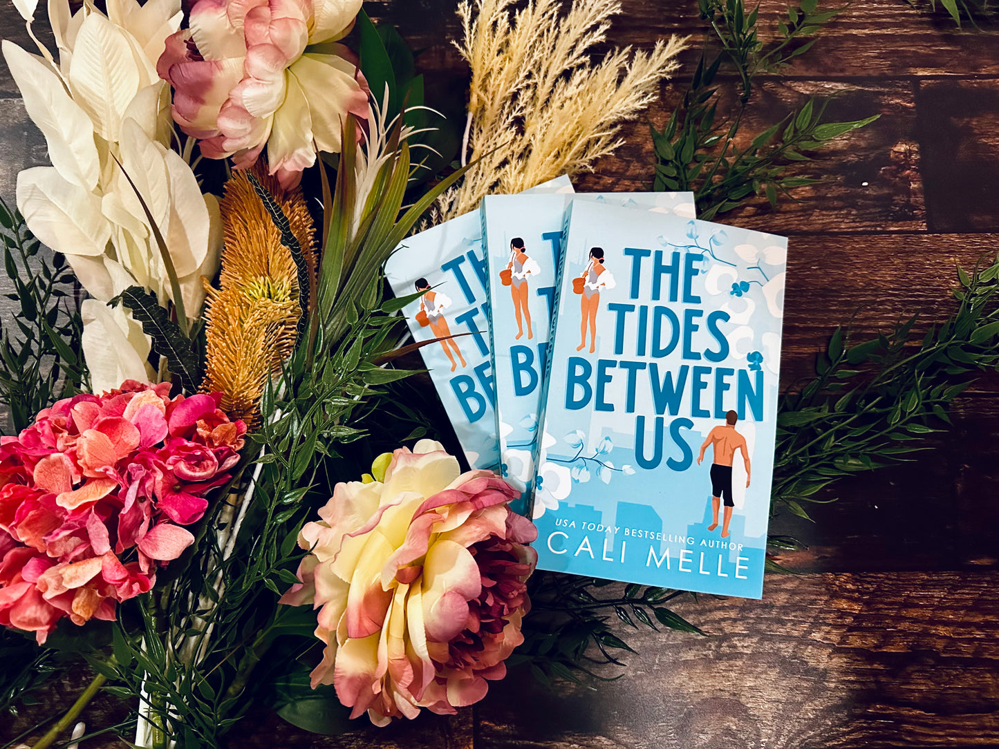 The Tides Between Us by Cali Melle (Orchid City Book 2)