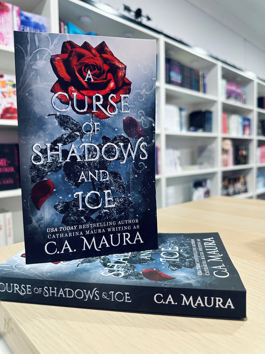 A Curse of Shadows and Ice by C.A. Maura