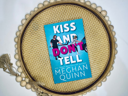 Kiss And Don’t Tell by Meghan Quinn